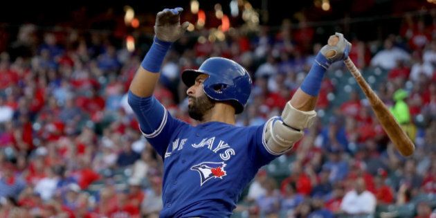 ARLINGTON, TX - OCTOBER 06: Jose Bautista #19 of the Toronto Blue Jays hits a three run home run to left field agianst Jake Diekman #41 of the Texas Rangers during the ninth inning in game one of the American League Divison Series at Globe Life Park in Arlington on October 6, 2016 in Arlington, Texas. (Photo by Ronald Martinez/Getty Images)