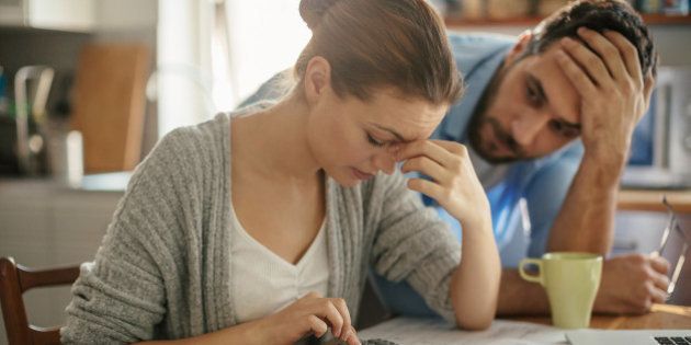 Photo of a couple going through financials problems