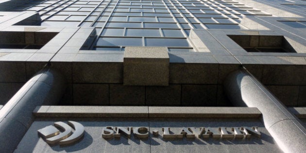 A view is seen on April 13, 2012 of SNC-Lavalin's headquarters in Montreal, Quebec. Police on Friday raided the headquarters of a Canadian engineering firm with dealings in Moamer Kadhafi's Libya and loosely linked to a failed plot to smuggle the ex-dictator's son into Mexico.The Royal Canadian Mounted Police executed a search warrant and the company is cooperating in the investigation, SNC-Lavalin said in a statement. 'The warrant relates to an investigation of certain individuals who are not or are no longer employed by the company,' it added. An AFP correspondent at the scene said all access to the building at Rene Levesque Boulevard West in downtown Montreal, which also houses a US consulate, was blocked. SNC-Lavalin last month fired its chief executive, Pierre Duhaime, after his 23 years with the company, amid accusations he allowed $56 million in payments to foreign agents for undocumented work. AFP PHOTO/GUILLAUME LAVALLEE (Photo credit should read Guillaume Lavallée/AFP/Getty Images)