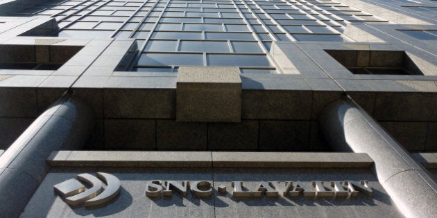 A view is seen on April 13, 2012 of SNC-Lavalin's headquarters in Montreal, Quebec. Police on Friday raided the headquarters of a Canadian engineering firm with dealings in Moamer Kadhafi's Libya and loosely linked to a failed plot to smuggle the ex-dictator's son into Mexico.The Royal Canadian Mounted Police executed a search warrant and the company is cooperating in the investigation, SNC-Lavalin said in a statement. 'The warrant relates to an investigation of certain individuals who are not or are no longer employed by the company,' it added. An AFP correspondent at the scene said all access to the building at Rene Levesque Boulevard West in downtown Montreal, which also houses a US consulate, was blocked. SNC-Lavalin last month fired its chief executive, Pierre Duhaime, after his 23 years with the company, amid accusations he allowed $56 million in payments to foreign agents for undocumented work. AFP PHOTO/GUILLAUME LAVALLEE (Photo credit should read Guillaume LavallÃ©e/AFP/Getty Images)