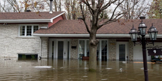 The flooded home of Mina Tayarani, who was evacuated after water levels passed the basement and reached over a foot on the main floor, is seen in a flooded residential neighbourhood in Ile Bizard, Quebec, Canada May 8, 2017. REUTERS/Christinne Muschi