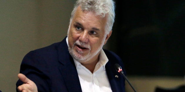 Quebec Premier Philippe Couillard speaks during a conference of New England's governors and eastern Canada's premiers to discuss closer regional collaboration, Monday, Aug. 29, 2016, in Boston. (AP Photo/Elise Amendola)