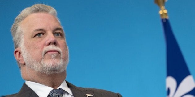 Quebec Prime minister Philippe Couillard gives a press conference following his meeting with French Prime Minister at the Hotel Matignon in Paris, on March 6, 2015. AFP PHOTO KENZO TRIBOUILLARD (Photo credit should read KENZO TRIBOUILLARD/AFP/Getty Images)