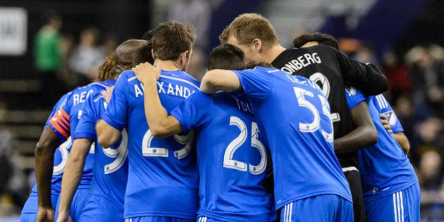MONTREAL, QC - MARCH 28: Members of the Montreal Impact huddle prior to the start of the MLS game against the Orlando City SC at the Olympic Stadium on March 28, 2015 in Montreal, Quebec, Canada. The game between Orlando City SC and the Montreal Impact ended in a 2-2 draw. (Photo by Minas Panagiotakis/Getty Images)
