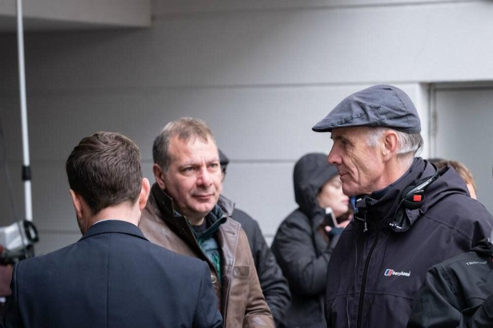 Writer Jed Mercurio (centre) on set during filming