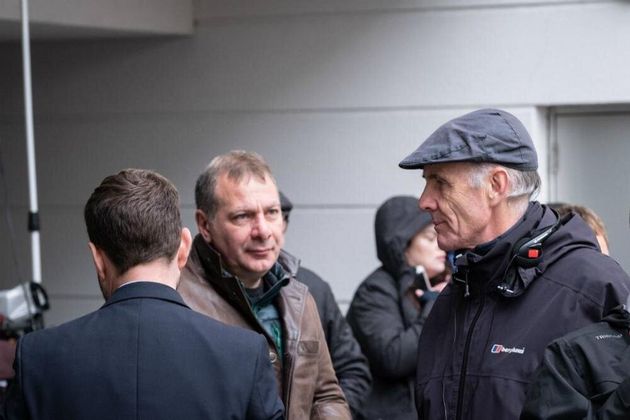 Writer Jed Mercurio (centre) on set during filming