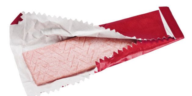 chewing gum is on the white background with paper