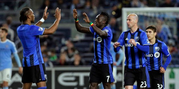 Apr 27, 2016; New York, NY, USA; Montreal Impact forward Dominic Oduro (7) celebrates scoring a goal during the second half against the New York City FC at Yankee Stadium. New York City FC and the Montreal Impact ended in a 1-1 tie. Mandatory Credit: Adam Hunger-USA TODAY Sports