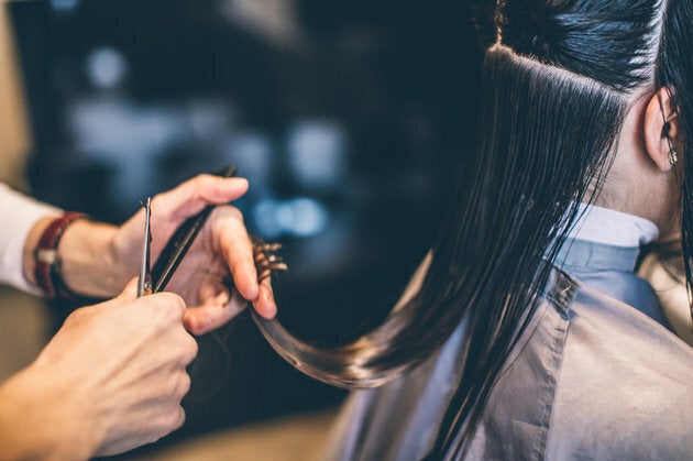 Young woman at hairdresser