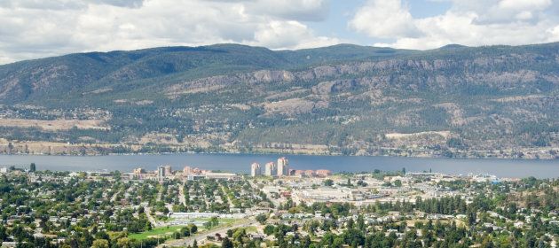 Aerial photo looking towards downtown Kelowna, BC and Lake Okanagan