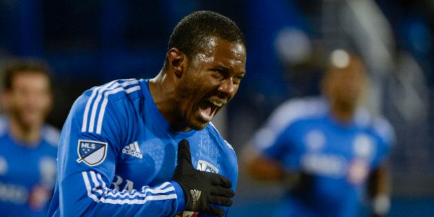 Oct 29, 2015; Montreal, Quebec, CAN; Montreal Impact midfielder Patrice Bernier (8) reacts after scoring a goal against the Toronto FC during the first half of a knockout round match of the 2015 MLS Cup Playoffs at Stade Saputo. Mandatory Credit: Eric Bolte-USA TODAY Sports