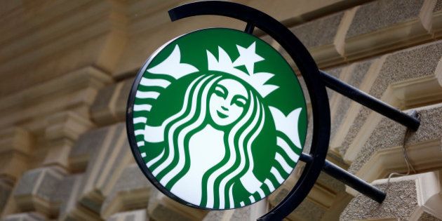 A Starbucks logo is seen at a Starbucks coffee shop in Vienna, Austria, June 21, 2016. REUTERS/Leonhard Foeger