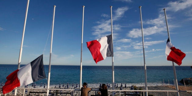 Flags fly at half-mast in memory of victims the day after a truck ran into a crowd at high speed killing scores and injuring more who were celebrating the Bastille Day national holiday, in Nice, France, July 15, 2016. REUTERS/Eric Gaillard