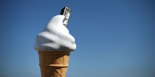 LOWESTOFT, ENGLAND - JULY 17: A giant plastic ice cream cone glints in the sun on the South Beach on July 17, 2014 in Lowestoft, England. The Met Office has issued a heatwave alert as temperatures throughout England and Wales are predicted to reach their highest level of the year this weekend. (Photo by Peter Macdiarmid/Getty Images)
