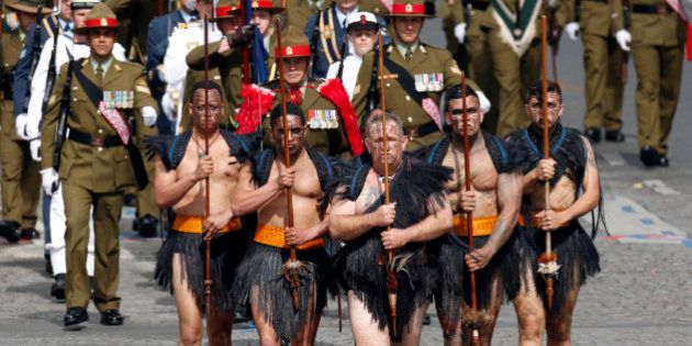 Maori warriors from New Zealand take part in the traditional Bastille Day military parade on the Champs Elysees in Paris, France, July 14, 2016. REUTERS/Benoit Tessier