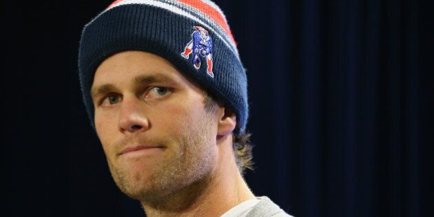 FOXBORO, MA - JANUARY 22: New England Patriots Quarterback Tom Brady talks to the media during a press conference to address the under inflation of footballs used in the AFC championship game at Gillette Stadium on January 22, 2015 in Foxboro, Massachusetts. (Photo by Maddie Meyer/Getty Images)
