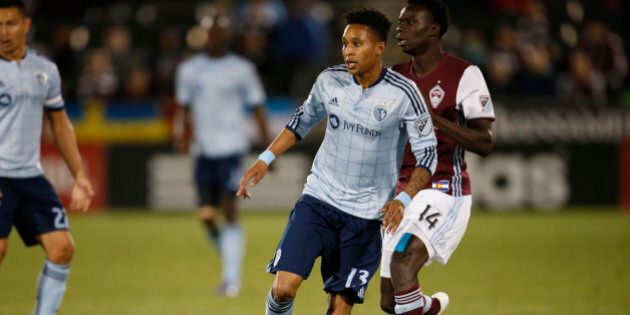 Sporting Kansas City defender Amadou Dia (13) in the second half of an MLS soccer game Wednesday, May 11, 2016, in Commerce City, Colo. Colorado won 1-0. (AP Photo/David Zalubowski)