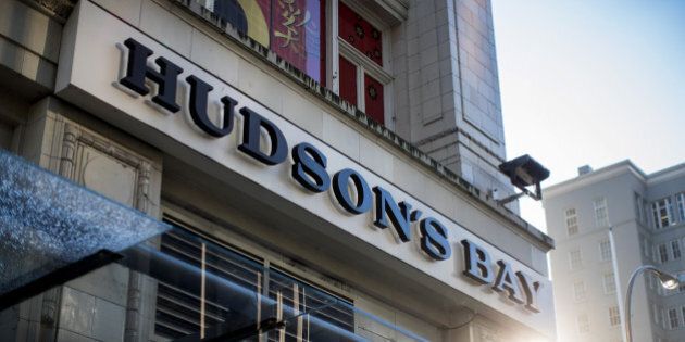Signage is displayed outside a Hudson's Bay Co. store in downtown Vancouver, British Columbia, Canada, on Thursday, Jan. 12, 2017. Hudsons Bay Co., the Canadian department-store giant that owns Saks Fifth Avenue and Lord & Taylor, suffered its worst stock decline in more than a year after a dismal holiday season weighed on its sales forecast. Photographer: Ben Nelms/Bloomberg via Getty Images