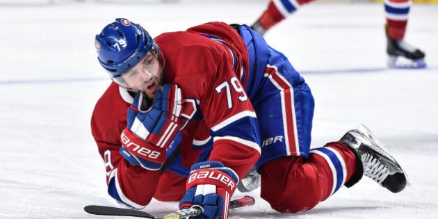 MONTREAL, QC - DECEMBER 12: Andrei Markov #79 of the Montreal Canadiens gets hurt during the NHL game against the Boston Bruins at the Bell Centre on December 12, 2016 in Montreal, Quebec, Canada. The Boston Bruins defeated the Montreal Canadiens 2-1 in overtime. (Photo by Minas Panagiotakis/Getty Images)