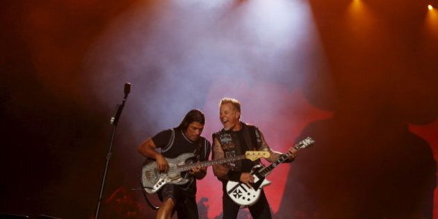 James Hetfield (R) and Robert Trujillo of Metallica perform during the Rock in Rio Music Festival in Rio de Janeiro, Brazil, September 20, 2015. REUTERS/Pilar Olivares