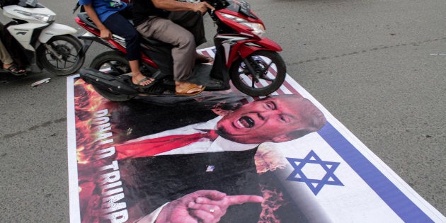 Manifestation de musulmans indonésiens contre la décision de Donald Trump de reconnaître Jérusalem comme capitale d'Israël, à Aceh, Indonésie, 22 décembre 2017.