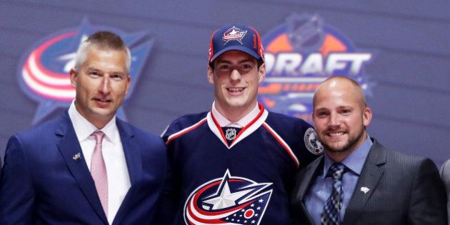 BUFFALO, NY - JUNE 24: Pierre-Luc Dubois celebrates with the Columbus Blue Jackets after being selected third overall during round one of the 2016 NHL Draft on June 24, 2016 in Buffalo, New York. (Photo by Bruce Bennett/Getty Images)