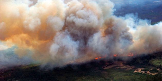 A Canadian Joint Operations Command aerial photo shows wildfires in Fort McMurray, Alberta, Canada in this image posted on twitter May 5, 2016. Courtesy CF Operations/Handout via REUTERS ATTENTION EDITORS - THIS IMAGE WAS PROVIDED BY A THIRD PARTY. EDITORIAL USE ONLY