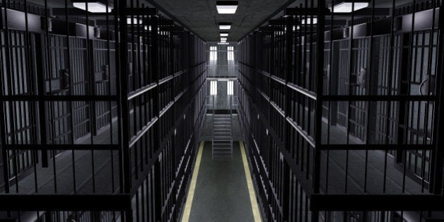 Dutch angle view looking up at the empty cells in a multi-tiered prison