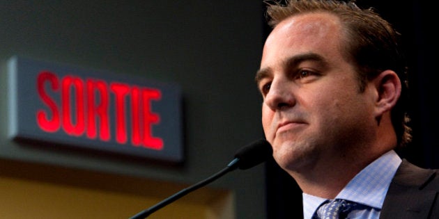 Geoff Molson, owner of the Montreal Canadiens NHL hockey team speaks to the media at a news conference in Brossard, Quebec, March 29, 2012. The struggling Montreal Canadiens have fired general manager Pierre Gauthier and accepted the resignation of acting consultant Bob Gainey on Thursday. REUTERS/Olivier Jean (CANADA - Tags: SPORT ICE HOCKEY)