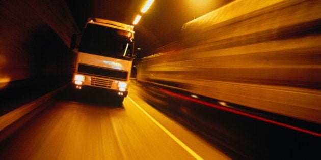 Lorry travelling through tunnel (blurred motion)