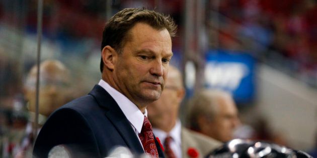November 7, 2013; Raleigh, NC, USA; Carolina Hurricanes coach Kirk Muller looks on against the New York Islanders at PNC Center. The Carolina Hurricanes defeated the New York Islanders 1-0. Mandatory Credit: James Guillory-USA TODAY Sports
