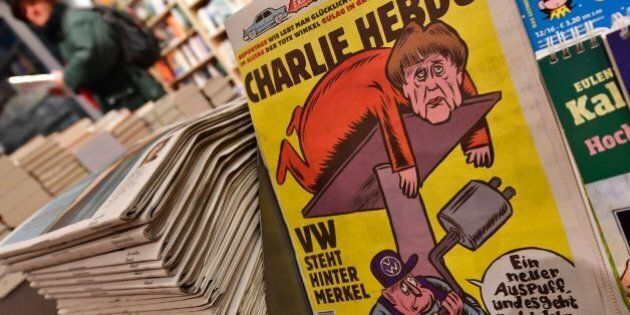 The first issues of the German version of French satirical weekly Charlie Hebdo are for sale at a newsstand in Berlin on December 1, 2016. / AFP / John MACDOUGALL (Photo credit should read JOHN MACDOUGALL/AFP/Getty Images)