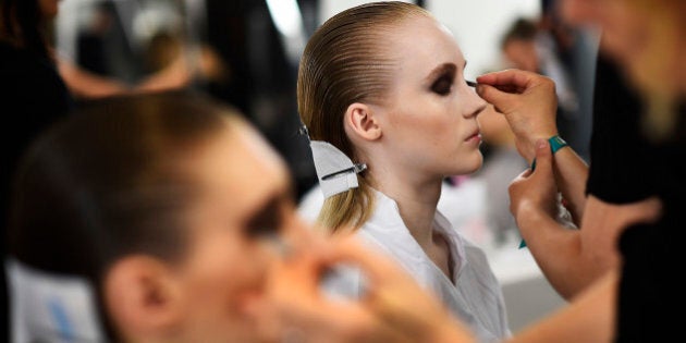 Models have their make-up applied inside Blenheim Palace ahead of a fashion show presenting the Dior, Cruise 2017 Collection, in Woodstock, Britain May 31, 2016. REUTERS/Dylan Martinez