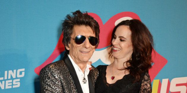 LONDON, ENGLAND - APRIL 04: Ronnie Wood (L) and Sally Wood attend a private view of 'The Rolling Stones: Exhibitionism' at The Saatchi Gallery on April 4, 2016 in London, England. (Photo by David M. Benett/Dave Benett/Getty Images