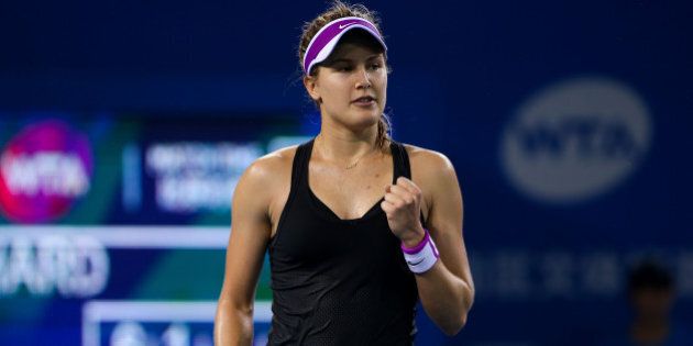 SHENZHEN, CHINA - JANUARY 05: (CHINA OUT) Eugenie Bouchard of Canada celebrates a point against Donna Vekic of England during Day three of 2016 WTA Shenzhen Open at Longgang Sports Center on January 5, 2016 in Shenzhen, Guangdong Province of China. (Photo by ChinaFotoPress/ChinaFotoPress via Getty Images)