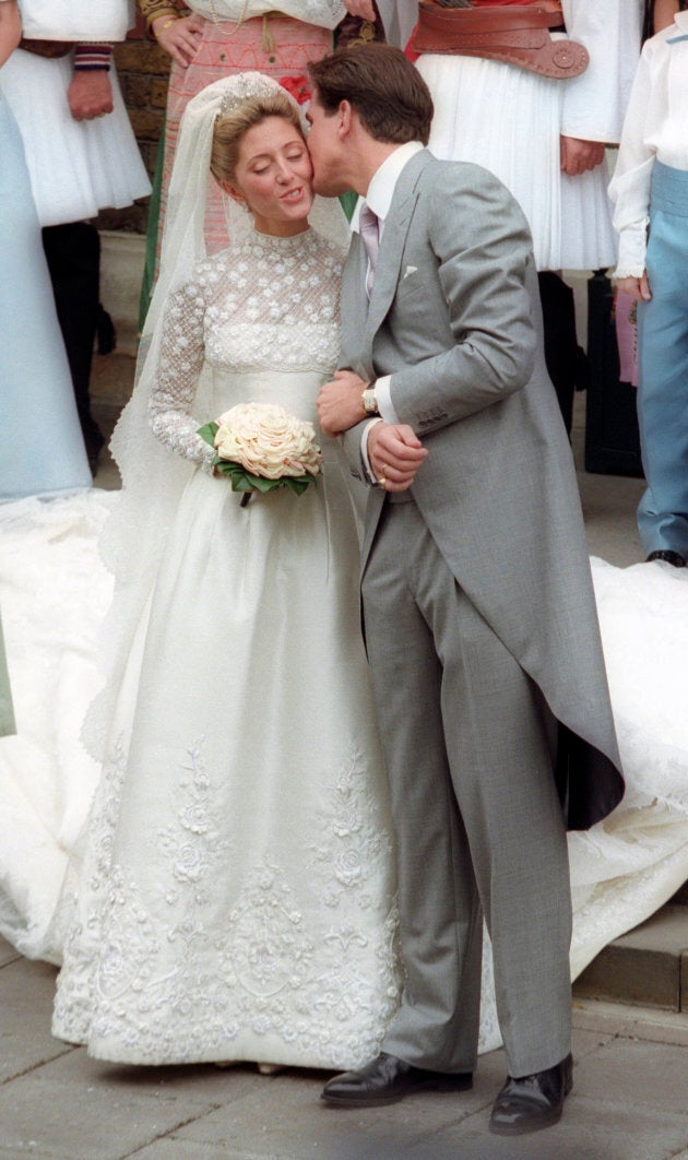 Crown Prince Pavlos kisses Marie-Chantal Miller after their wedding at the Greek Orthodox Cathedral in London July 1, 1995.