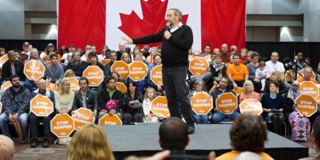 NDP leader Thomas Mulcair speaks at a campaign rally in London, Ontario October 4, 2015. New polling showed the former frontrunner in Canada's legislative elections could finish third over its opposition to a popular niqab ban, as political leaders squared off in a final debate October 2. The race is still too close to call, with the rivals sparring over taxes, trade negotiations, the Syrian refugee crisis, air strikes against the Islamic State group, and upcoming Paris climate talks.Thomas Mulcair's New Democrats jumped into the lead at the start of the race in July and held it through most of the campaign. AFP PHOTO/GEOFF ROBINS (Photo credit should read GEOFF ROBINS/AFP/Getty Images)