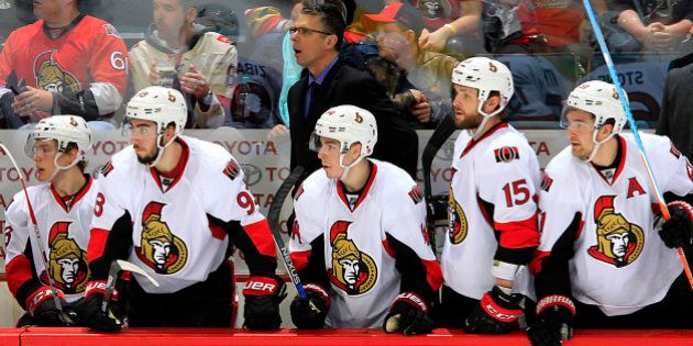 WINNIPEG, MB - MARCH 30: Head Coach Dave Cameron of the Ottawa Senators looks on from the bench behind the player during second period action against the Winnipeg Jets at the MTS Centre on March 30, 2016 in Winnipeg, Manitoba, Canada. (Photo by Darcy Finley/NHLI via Getty Images)