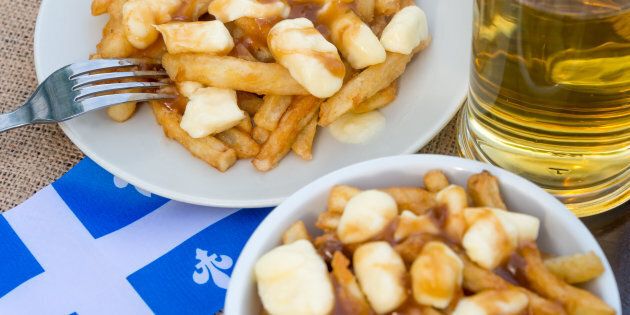 Classic Quebec poutine with french fries, gravy, and cheese curds