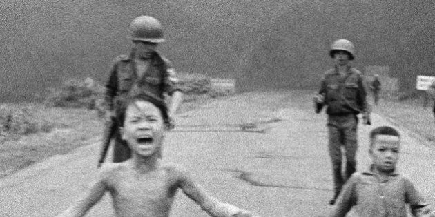 FILE - This is a June 8, 1972 file photo of South Vietnamese forces follow after terrified children, including 9-year-old Kim Phuc, center, as they run down Route 1 near Trang Bang after an aerial napalm attack on suspected Viet Cong hiding places . Norway's Prime Minister Erna Solberg ï»¿on Friday Sept. 9, 2016 challenged Facebookâs restrictions on nude photos by posting an iconic 1972 image of a naked girl running from an aerial napalm attack in Vietnam. The Pulitzer Prize-winning image by Associated Press photographer Nick Ut is at the center of a heated debate about freedom of speech in Norway after Facebook deleted it from a Norwegian authorâs page last month. (AP Photo/Nick Ut, File)