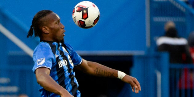 Jun 8, 2016; Montreal, Ontario, Canada; Montreal Impact forward Didier Drogba (11) plays the ball during the first half against the Toronto FC at Stade Saputo. Mandatory Credit: Eric Bolte-USA TODAY Sports