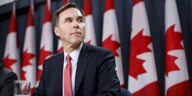 Canada's Finance Minister Bill Morneau takes part in a news conference in Ottawa, Canada, December 7, 2015. The new Canadian government's planned tax hike on the rich will bring in less money than forecast and will not cover the cost of a promised middle-class tax cut, according to an official release on Monday. A government document said the tax hike would bring in C$2.01 billion ($1.49 billion), while the cost of the tax cut would be C$3.44 billion ($2.55 billion). REUTERS/Chris Wattie?