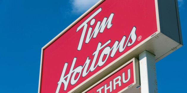 TORONTO, ONTARIO, CANADA - 2016/03/04: Tim Horton's drive through sign: Tim Horton is known all over Canada for serving hot and delicious coffee specially in winter time. (Photo by Roberto Machado Noa/LightRocket via Getty Images)