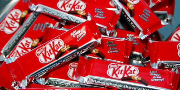 Bars of KitKat chocolates, manufactured by Nestle SA, are arranged for a photograph ahead of the company's results news conference in Vevey, Switzerland, on Thursday, Feb. 16, 2012. Nestle SA, the world's biggest food company, reported 2011 sales growth that beat analysts' estimates and forecast higher 2012 earnings as it introduces products such as the Nescafe Alegria coffee maker. Photographer: Gianluca Colla/Bloomberg via Getty Images