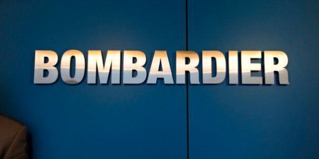 The logo of Bombardier Inc. sits on display at the Paris Air Show in Paris, France, on Wednesday, June 22, 2011. The 49th International Paris Air Show, the world's largest aviation and space industry show, takes place at Le Bourget airport June 20-26. Photographer: Fabrice Dimier/Bloomberg via Getty Images
