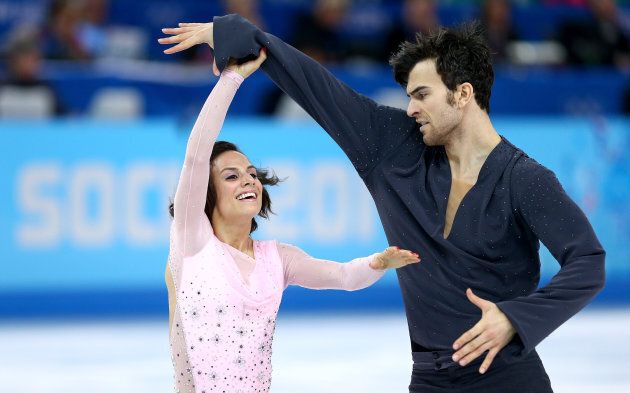 SOCHI, RUSSIA - FEBRUARY 11: Meagan Duhamel and Eric Radford of Canada compete during the Figure Skating Pairs Short Program on day four of the Sochi 2014 Winter Olympics at Iceberg Skating Palace on February 11, 2014 in Sochi, Russia. (Photo by Paul Gilham/Getty Images)