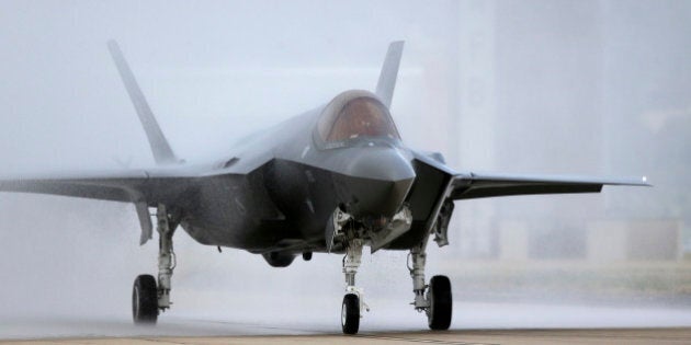 An F-35 arrives at it new operational base Wednesday, Sept. 2, 2015, at Hill Air Force Base, in northern Utah. Two F-35 jets touched down Wednesday afternoon at the base, about 20 miles north of Salt Lake City. A total of 72 of the fighter jets and their pilots will be permanently based in Utah. (AP Photo/Rick Bowmer)