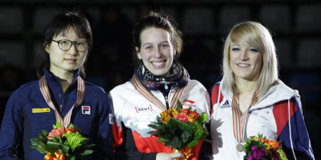 SEOUL, SOUTH KOREA - MARCH 12: (L to R) Silver medalist Choi Min-Jeong of South Korea, gold medalst Marianne St-Gelais of Canada and bronze medalist Elise Christie of Great Britain celebrate on the podium during the victory ceremony for the Ladies 1500m Finals during the ISU World Short Track Speed Skating Championships 2016 at Mokdong Icerink on March 12, 2016 in Seoul, South Korea. (Photo by Chung Sung-Jun - ISU/ISU via Getty Images)