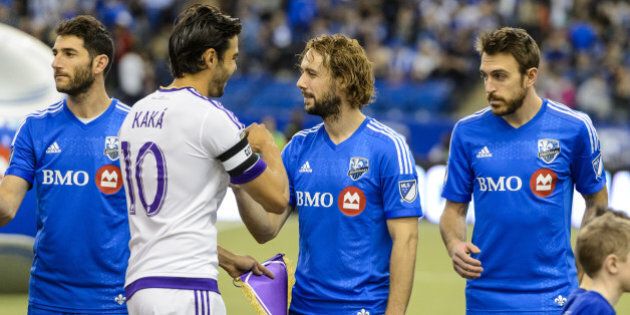 MONTREAL, QC - MARCH 28: Kaka #10 of Orlando City SC shakes hands with Marco Donadel #33 of Montreal Impact prior to the start of the MLS game at the Olympic Stadium on March 28, 2015 in Montreal, Quebec, Canada. The game between Orlando City SC and the Montreal Impact ended in a 2-2 draw. (Photo by Minas Panagiotakis/Getty Images)
