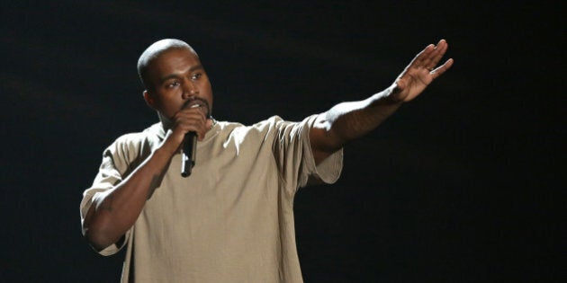 Kanye West accepts the video vanguard award at the MTV Video Music Awards at the Microsoft Theater on Sunday, Aug. 30, 2015, in Los Angeles. (Photo by Matt Sayles/Invision/AP)